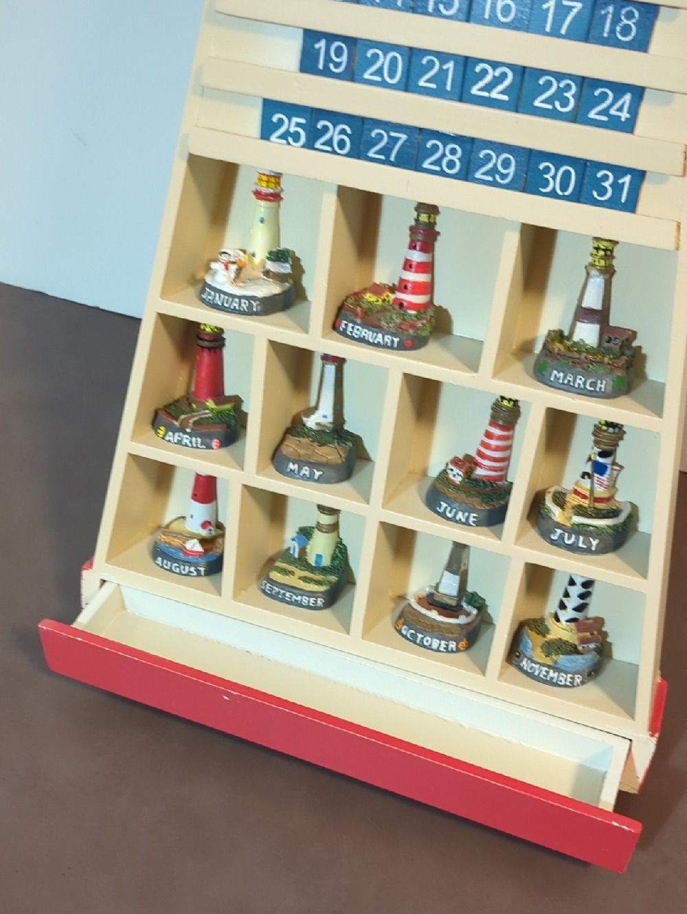 Lighthouse Perpetual Calendar With Wall Shelf With 12 Ceramic Light Houses 1-31 - Picture 6 of 15